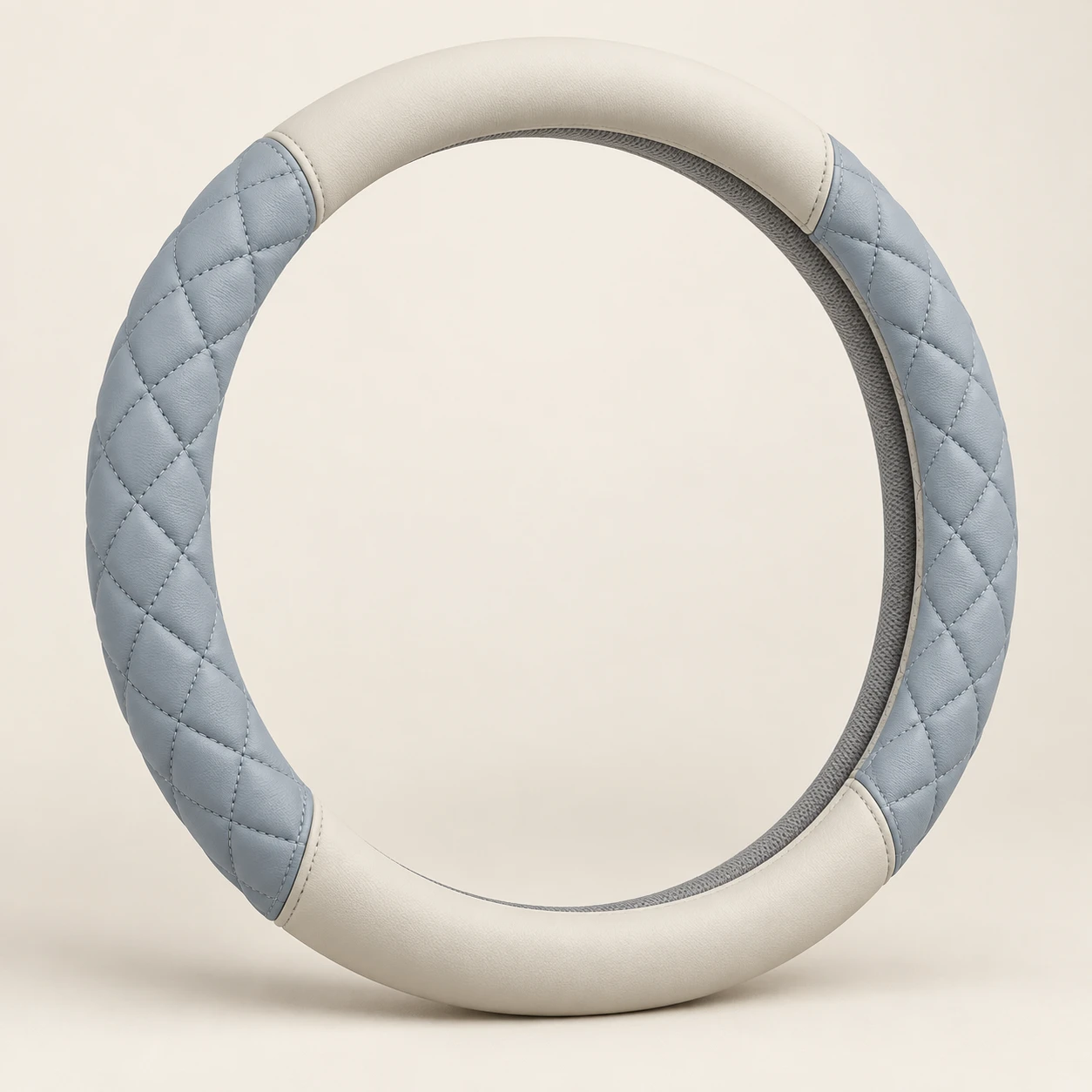 Blue Quilted Arc steering wheel cover in Misty blue / light gray