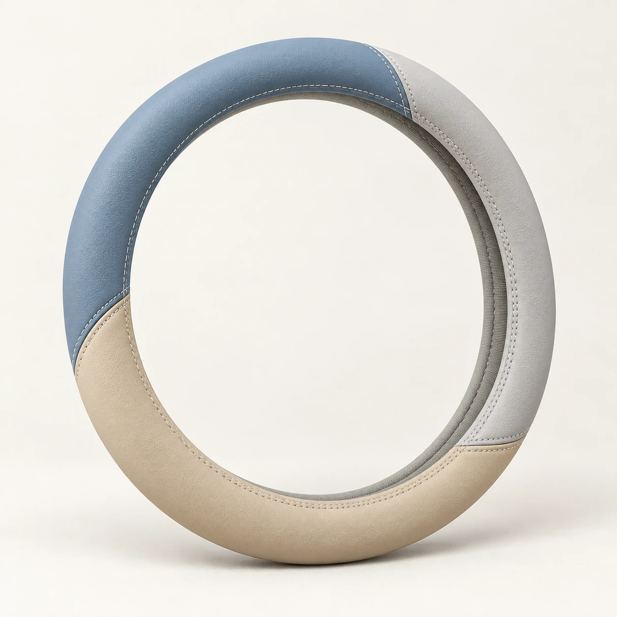 Coastal Signature Curve steering wheel cover in Misty blue / light gray / sand